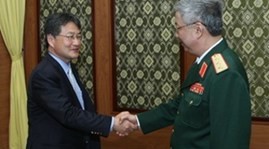 US, Vietnam boost defence cooperation  - ảnh 1